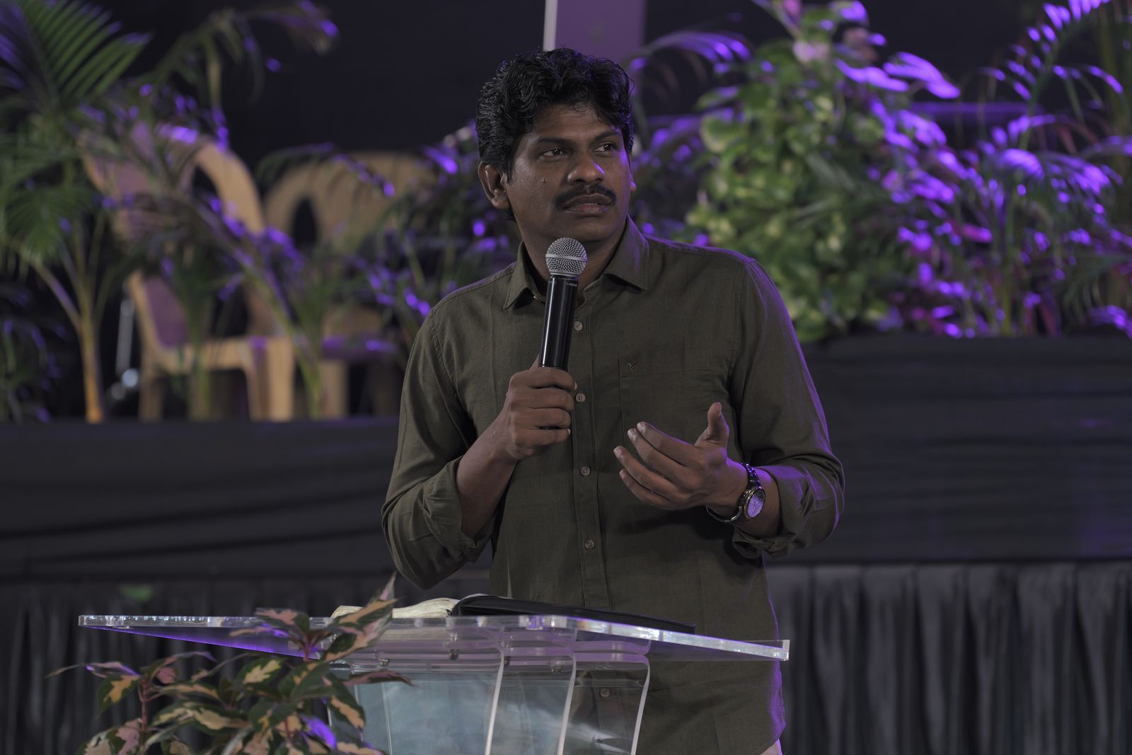Bro. Smiles preaching a prophetic message